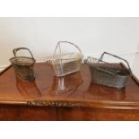 Three silver plate wine bottle holders