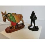 Figure of Bomber Command and ceramic Donkey.