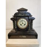 Slate and marbleised mantle clock.