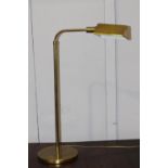 Adjustable brass desk lamp.