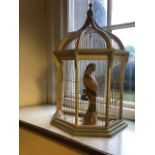 Antique style bird cage complete with bird {48 cm W x 75 cm H}
