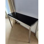 Chrome console table with leather top {122 cm W x 81 cm H}.