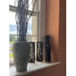 Glazed vase, African carved decoration, and two ceramic wall decorations depicting children with
