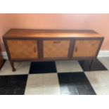 Mid-century teak sideboard with parquetry design doors flanking a fall front centre section {180