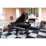 Steinway and Sons ebonised grand piano {140 cm W x 95 cm H x 200 cm D}