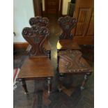 Set of four William IV mahogany hall chairs with shield shaped motif {42 cm W x 90cm H x 44 cm D}