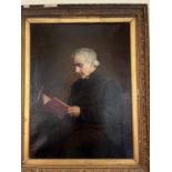 19th Century oil on canvas of priest reading in decorative gilt frame {102 cm W x 127 cm H}