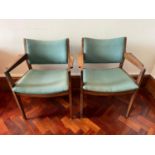 Pair of mid-century teak armchairs with green upholstery, by John Hogg, Navan. {59 cm W x 77 cm H