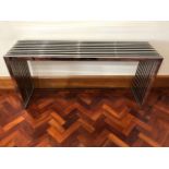 Designer chrome console table {150 cm W x 75 cm H x 40 cm D}