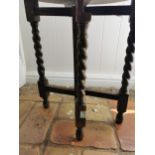 Edwardian oak gate leg table raised on barley twist legs { 51cm H X 44cm W }.
