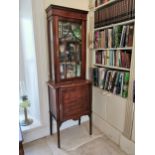 Edwardian inlaid mahogany display cabinet the single glazed door above a panelled door raise on
