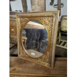 Decorative gilt mirror with oval plate { 56cm H X 66cm W }.