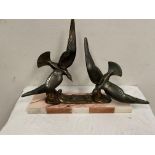 Art Deco spelter model of two birds in flight mounted on an onyx base { 48cm H X 58cm W X 18cm D ].