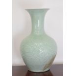Large porcelain oriental vase with lotus decoration . {70 cm H x 50 cm Dia}
