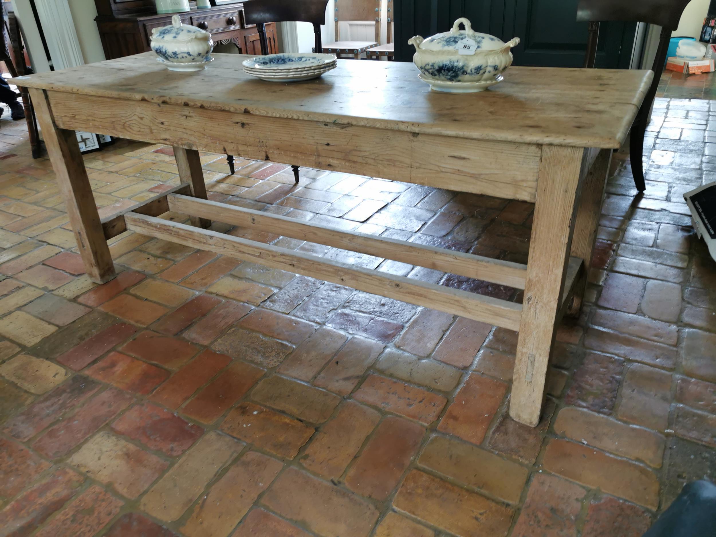 19th. C. stripped pine kitchen table, with single drawer in the frieze raised on square legs and - Image 3 of 4