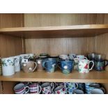 Collection of twenty two misc. pottery mugs