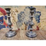 Pair of silverplated candlesticks, in the Rococo style. { 33cm H X 14cm Dia }.