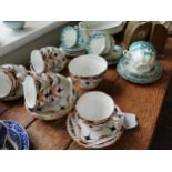 Misc collection of six ceramic part tea sets, six glass napkin rings and a pair of books ends