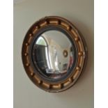 19th. C. gilt framed wall mirror with convex plate { 41cm Dia }.