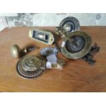 Three 19th. C. brass door bells, door knob and a brass room bell