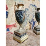 Pair of brass and varigated marble side urns { 30cm H X 10cm Sq}.