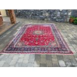 Hand knotted wool rug { 342cm L X 250cm W }.