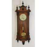 19th C. Walnut and ebony single weight Vienna wall clock. {120 cm H x 45 cm W}.