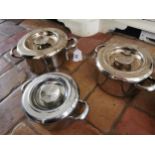 Set of three graduated AGA saucepans and AGA cast iron deep pan.