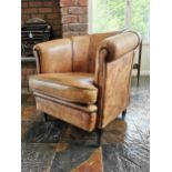 Leather upholstered tub chair { 79cm H X 72cm W X 83cm D }.