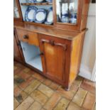 19th. C. oak two piece dresser, the centre open shelves flanked two glazed doors one centre drawer