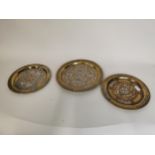 Three 19th C. brass and copper Cairoware graduated plates. {36 cm Dia, 32 cm Dia and 30 cm Dia}.