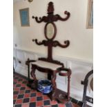 Very good quality 19th. C. mahogany coat and hat stand, the mirrored back above a marble top over