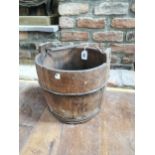 Wooden bucket with metal straps and handle { 35cm H X 37cm Dia }.