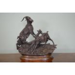 Bronze group of wild Goats on rocky ground. {35 cm H x 35 cm W x 16 cm D}.