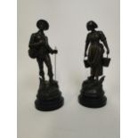 Pair of bronzed spelter figures of Man and Lady. Man {37 cm H x 12 cm Dia} and Lady {35 cm H x 12 cm