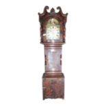 19th. C. flame mahogany long cased clock with painted arched dial with pendulum and weights.