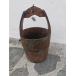 Wooden metal bound water bucket { 70cm H X 36cm Dia }.