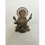Brass figure of four armed Buddha. {10 cm H x 9 cm W x 7 cm D}