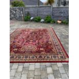 Hand knotted wool rug {390cm L X 304cm W }.