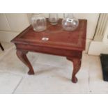 Oriental hardwood coffee table inlaid with brass { 40cm H X 56cm W X 54cm D }.