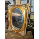 Decorative gilt mirror with oval plate { 96cm H X 70cm W }.