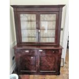 19th. C. scumbled pine glass case, the two glazed doors over two drawers and two panelled doors. {