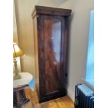 19th. C. mahogany bachelor's robe with single door raised on platform base { 203cm H X 65cm W X 61cm