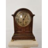 Late 19th C. oak and brass mantle clock with silver dial. {36 cm H x 28 cm W x 21 cm D}.