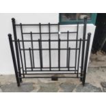 Two modern wrought iron beds { 138cm H X 120cm W & 138cm H X 134cm W }.