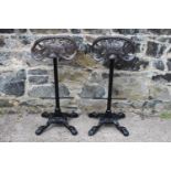 Pair of cast iron Blackstone tractor seat bar stools. {82 cm H x 37 cm W x 32 cm D}