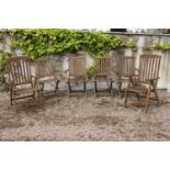 Set of four teak folding armchairs and a pair of Carvers. Armchairs. {93 cm H x 57 cm W x 36 cm D}