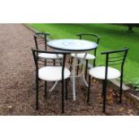 Wrought iron table with marble top and four metal and leather upholstered chairs . Table {73cm H x