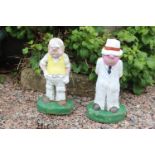 Two stone figures of Cricket player and Umpire. {56 cm H x 27 cm W x 18 cm D}.