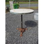 Circular garden table raised on cast iron base {74 cm H x 60 cm Dia.}.